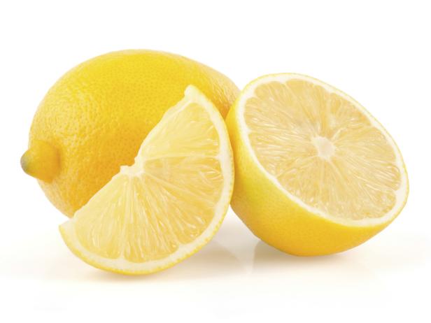 Lemon with Half and Slice on White Background