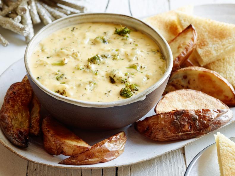 ROASTED BROCCOLI AND CHEDDAR CHEESE DIP
Food Network Kitchen
Food Network
Broccoli, Vegetable Oil, Kosher Salt, Black Pepper, Butter, Yellow Onion, Garlic, Flour,
HalfandHalf,
Mild Cheddar, Monterey Jack, Dijon Mustard