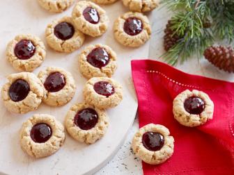 PEANUT BUTTER AND JELLY THUMBPRINT COOKIESKatie LeeFood NetworkNonstick Cooking Spray, Unsalted Roasted Peanuts, OldfashionedRolled Oats, Flour, FineSalt, Butter, Sugar, Egg, Vanilla Extract, Favorite Jelly