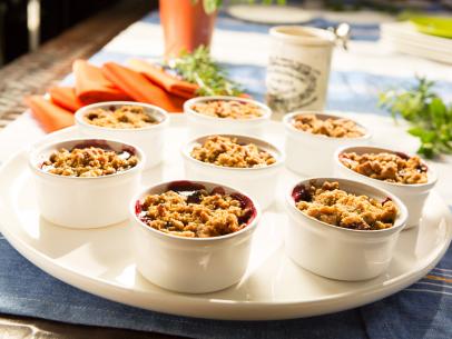 Food beauty of the Mini Cherry Gingerbread Crumbles at the festive Thanksgiving celebration, as seen on Food Network’s Patricia Heaton Parties, Season 1.