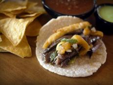<p>Taco Guild, housed in a former Methodist church, has acquired a devout following of taco lovers. You can enjoy a meal under stained glass windows and visit the bar for daily "Confession Hours".</p>