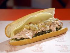 Marc Summers heads to this spot for the Philly cheesesteak, which features thin-sliced rib-eye steak, provolone and a tasty ladleful of red gravy on top. Rachael Ray can’t get enough of the Italian Roast Pork Sandwich, which is piled high with slow-roasted ham, broccoli rabe and sliced provolone.