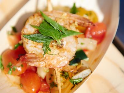 Finalist Arnold Myint's dish, Mediterranean Shrimp Lollipop with Grilled Fennel Chopped Salad, for the Star Challenge, July 4th Cookout, as seen on Food Network Star, Season 11.