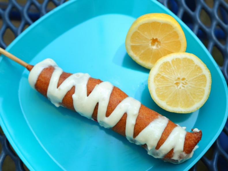 This is no ordinary corn dog, in fact this is a tasty lobster dog served up with homemade lemon aioli sauce, as seen on Food Network's Carnival Cravings with Anthony Anderson.