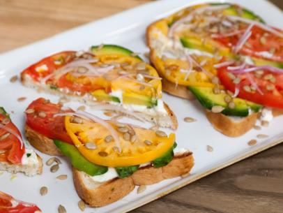 Open faced avocado sandwiches, as prepared by host Valerie Bertinelli, topped with sliced tomato, avocado and ricotta, as seen on Valerieâ  s Home Cooking.