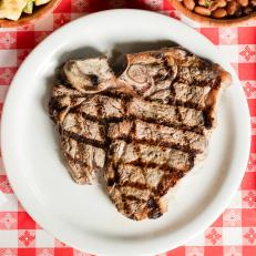Mesquite grilled Cowboy Steak and all of the fixings. One of our iconic Arizona dishes and the restaurants that serve them. Food photography and article by Jackie Alpers for the Food Network.
