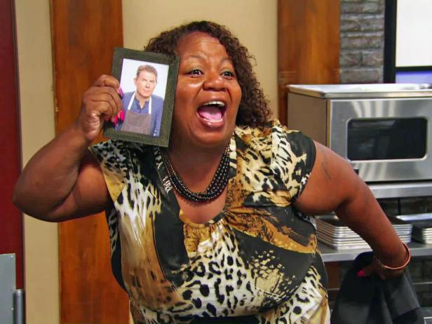 Carla holds a picture of Bobby