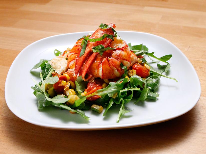 Mentor Anne Burrell's Poached Lobster over Corn and Cherry Tomato Salad is displayed, as seen on Food Network's Worst Cooks in America, Season 10.