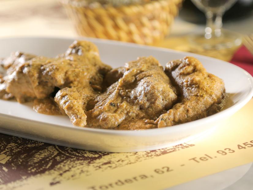 Granny's Rabbit in Liver Sauce as served at Cal Boter in Barcelona, Spain as seen on Food Network's Diners, Drive-Ins and Dives episode 2601.