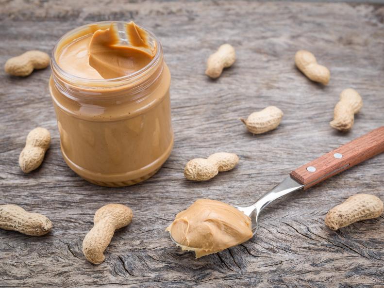 Peanut cream in a jar. Dietary foods for the heart.