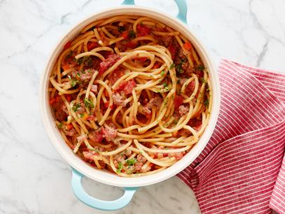 Food Network Kitchen’s OnePot Bucatini Bolognese as seen on Food Network.