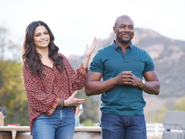 Hosts Camila Alves and Eddie Jackson, during the Chicken BBQ Challenge, as seen on Food Network’s Kids BBQ Challenge Season 1.