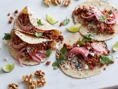 Food Network Kitchen’s Nut Meat Tacos with Pickled Red Onions.