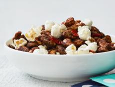 When it comes time to watch the action unfold on the movie screen, even chefs who spend their days making masterful dishes prefer to cozy up with low-fuss snacks.