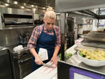 Guest Busy Philipps prepares bacon to wrap around avocados for "The Rolling Stone" dish at Estrella, as seen on Cooking Channel’s Star Plates, Season 1.