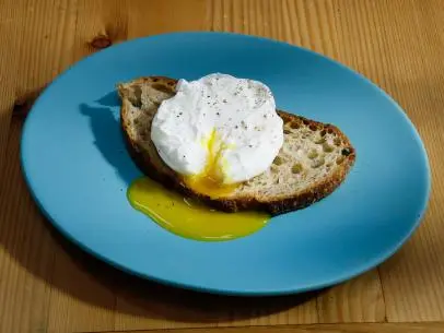 A Poached Egg is displayed, as seen on Food Network's The Kitchen, Season 12.