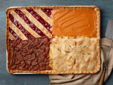 A clever sheet pan hack gives you quadruple the Thanksgiving pie fun (and saves the time and effort of making four individual pies). Apple, cherry, pumpkin and pecan coexist peacefully in one giant slab that feeds a crowd.