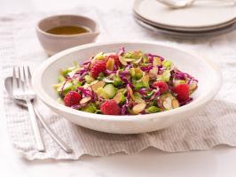 Brussels Sprout Slaw with Raspberries and Almonds.