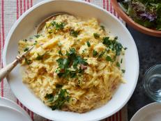 No waiting for water to boil here: Spaghetti squash proves (once again) that it can sub out pasta. It's perfect in this pancetta-and-egg enriched cream sauce. Microwaving the squash is a clever trick that cuts down on time.