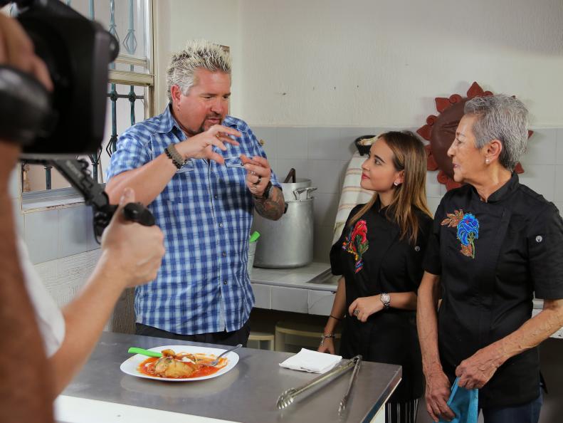 Behind-The-Scenes with Host Guy Fieri, Chef and Owner Carmen Giardiello, Granddaughter Fernanda Giardiello, and crew at El Rincon de Los Antojos in Costa Del Sol Colony, Cancun, Mexico as seen on Food Network's Diners, Drive-Ins and Dives episode 2606.