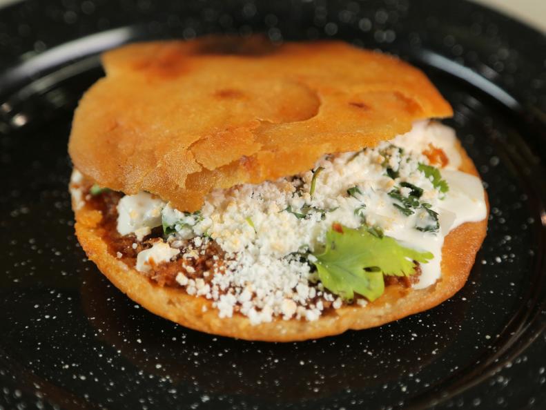 Pressed Chicharron Gorditta as served at El Rincon de Los Antojos in Costa Del Sol Colony, Cancun, Mexico as seen on Food Network's Diners, Drive-Ins and Dives episode 2606.