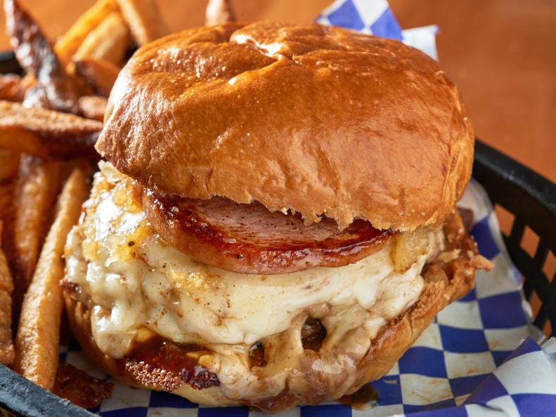 The Junction - HAWAII Consolidated Burger with housmade dry rub, Spicy Teriyaki Sauce, Canadian Bacon, Monterey Jack cheese and pineapple jam