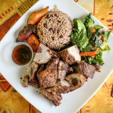 Florida offers plenty of tastes of the Caribbean, but jerk sits at the top of the expat food pyramid. JamRock Cuisine in Kendall is not your average Jamaican restaurant — it actually specializes in Chinese-Jamaican dishes, developed by the Chinese immigrants who started arriving on the island nation’s shores in the 1800’s. Even with the diverse options (all of which are worth sampling), the jerk pork is a perennial mouth-searing hit. Picnic ham is marinated in jerk seasoning and sauce, roasted in the oven, then sliced and served with an extra side of the potentially tear-inducing sauce. It also comes white rice or the more traditional peas and rice. Use either to temper the fierce heat.