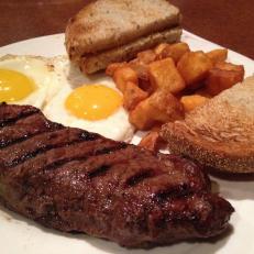 Known lovingly as "steggs," the no-frills late-night/early-morning steak and eggs plate is a cherished ritual for casino workers, tourists and night owls alike. Among the many 24-hour diners near the Las Vegas Strip, the Ellis Island Cafe rises to the top. Established in 1968, the local favorite aims to please with a generously sized New York strip, two eggs, toast and potatoes, all for a price hovering at or below ten dollars.