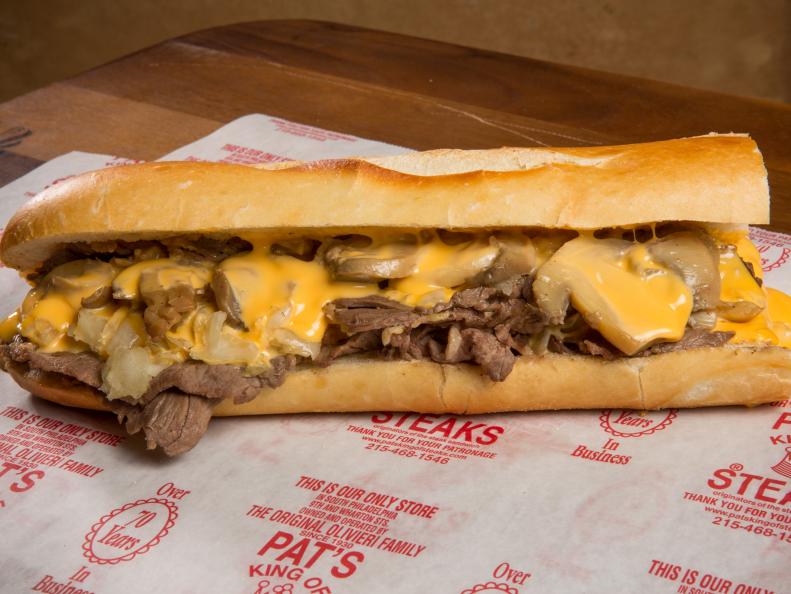 As far as sandwich wars are concerned, this is probably the biggest. The venerable Philly cheesesteak has two shops battling it out: Pat's King of Steaks and Geno's Steaks. And they happen to be located just 262 feet away from each other. Pat's was founded by Pasquale "Pat" and Harry Olivieri, and the brothers claim they invented the sub sandwich that consists of an Italian roll layered with thinly sliced, well-done beef off the flattop, grilled chopped onions, and Cheez Whiz, American or provolone cheese. It wasn't until 1966 that Geno's came around and the rivalry began. The competition between the two, however, is friendly, with current Pat's owner Frank Jr. (grandson of Harry) and his childhood friend Geno Vento (founder Joey Vento's son) agreeing to keep prices the same.