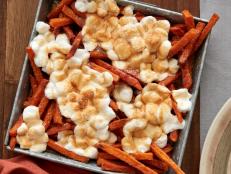 Cooking Channel serves up this Sweet Potato Poutine recipe from Nadia G. plus many other recipes at CookingChannelTV.com
