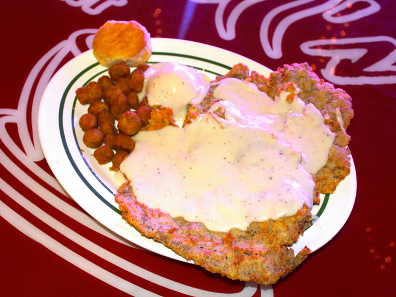 In 1988 the state legislature placed chicken-fried steak on the official Oklahoma State Meal list, so it’s common to any patch of red dirt within shouting distance of a deep-fryer. Kendall’s Restaurant in Noble has been chicken-frying its steaks for more than three decades over three moves, and doing it so well, crowds line up for crisp-on-the-outside, juicy-in-the-center steaks. Hubcap-size tenderized pieces of batter-fried round steak are served with the gravy — usually cream-based — mashed potatoes and, with any luck, fried okra.