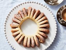 If you are a fan of rugelach -- a totally snackable pastry made with cream cheese dough and usually a fruit, nut or chocolate filling -- then this festive wreath is perfect for your crowd. Serve the centerpiece-worthy treat with coffee or tea and encourage guests to break off a cookie.