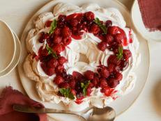 This edible wreath is almost too pretty to eat (but seriously, you should dive in -- it's delicious.) Crisp and crunchy meringue lies beneath a ruby red cranberry, raspberry and pomegranate sauce.
