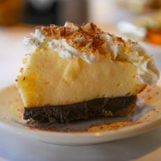 Though often considered a classic Southern dessert, black bottom pie has also been attributed to a chef in California in the 1940s. Whatever its origins, Mississippians have long associated it with Weidmann’s, a Continental-style restaurant with a heavy Creole accent in downtown Meridian. Their recipe, which has appeared in countless community cookbooks, features a gingersnap crust topped with two custards — one chocolate and the other spiked with bourbon — crowned with whipped cream and chocolate shavings. The restaurant’s menu and décor have evolved over the years but the signature pie remains constant.
