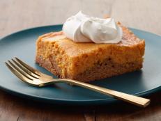 Pumpkin pie lovers will adore this easy cake -- the pumpkin pie filling is baked into a spice cake crust, so you don't have to worry about pie dough, and you can get straight to the best part -- the rich pumpkin filling topped with whipped cream!