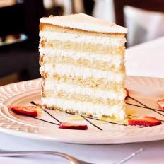 The coconut cake at this fine-dining destination made its debut as a Valentine’s Day special in 1997. But the 12-layer cake made such an impression that it’s been on the menu ever since. Available by the slice at the restaurant (or whole for shipping nationwide), the lofty confection — with six thin layers of cake separated by six layers of cream cheese frosting — has won the hearts of locals and celebrities alike.