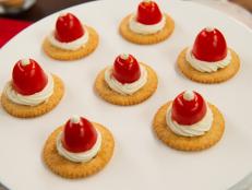 These Santa hats are a fun way to serve up a classic appetizer: cheese and crackers!