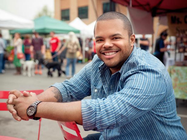 Host Roger Mooking visits booths at the Pearl Farmers Market in San Antonio, as seen on Cooking Channel's Man Fire Food, Season 3.