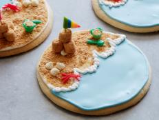 Reminiscing about a wonderful day in the sun? Come inside and build these scenic sandcastle cookies to celebrate beach days all summer long.