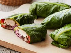 Collard greens let tortillas take a break: steaming the leaves make them pliable enough to roll up into fiber- and protein-packed burritos filled with jerk chicken, coconut black beans and a creamy lime slaw. You won't miss the tortillas at all.