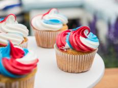 This super simple technique for patriotic tri-color cupcake icing will make your treats will look so great that your guests will swear you bought them from a professional bakery!