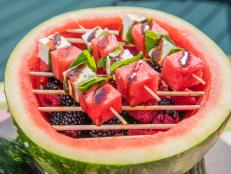 Check out this "hot" new twist on summer fruit salad: A simple, crowd-pleasing food craft turns the average fruit salad bowl into a super cool watermelon grill.