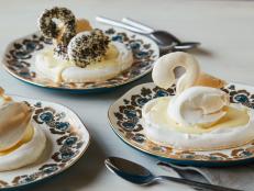 Light-as-air meringue swans float upon individual meringue lakes filled with rich vanilla creme anglaise. This dessert is almost too beautiful to eat, but too delicious not to.