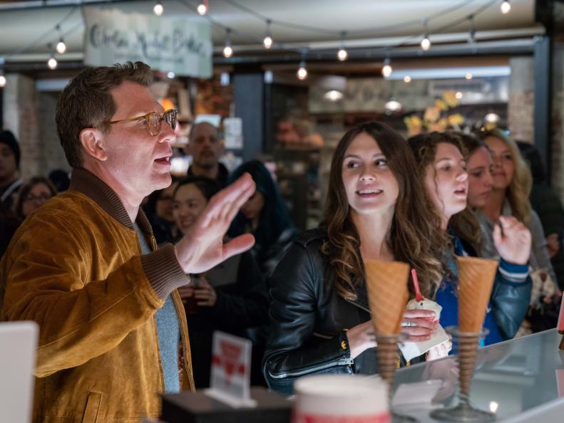 Hosts Bobby Flay and Sophie Flay sample gelato at Gelato Artigianale at Chelsea Market, as seen on Flay vs Flay, Season 1.