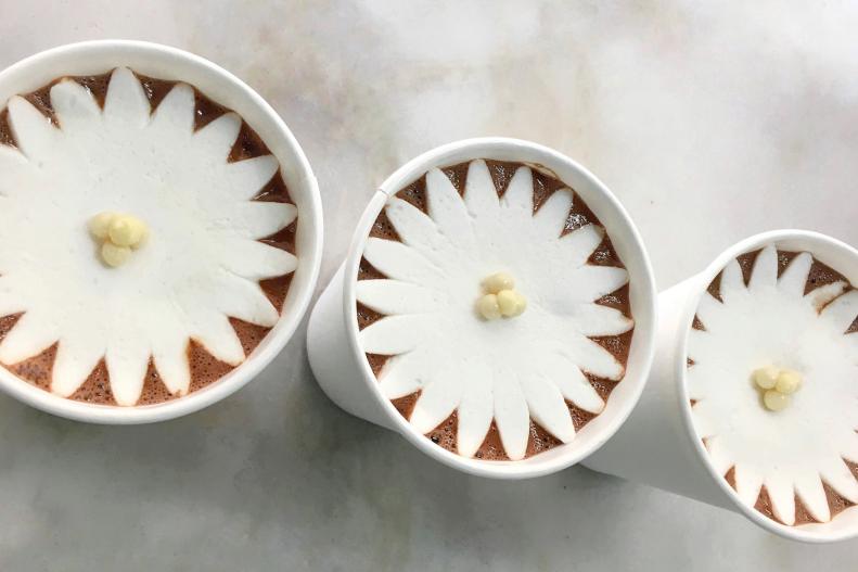 Leave it to Dominque Ansel to give hot chocolate a truly theatrical presentation. Before you sip, watch a flower-shaped marshmallow blossom when it's placed in the cup. The surprises don't end there — when the flower fully blossoms, it reveals a chocolate bonbon inside.
