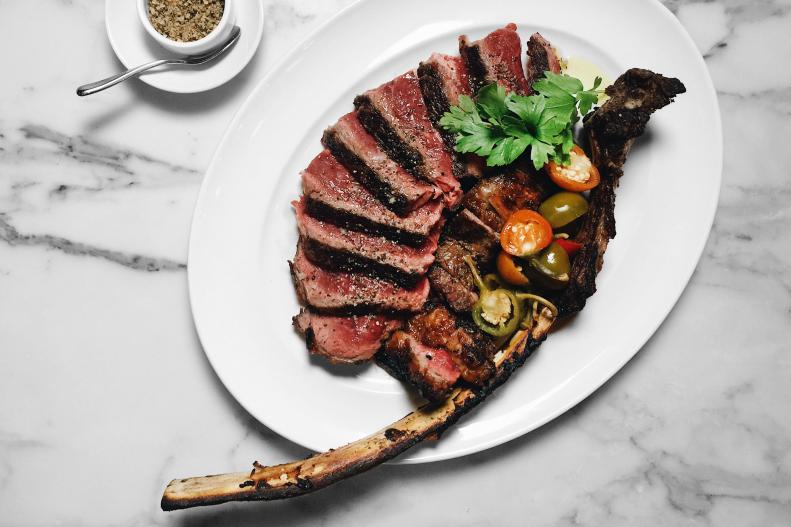 There are plenty of steak options in Chicago's River North neighborhood, but RPM sets the bar for quality and variety of beef. For traditional meat-and-potato types, it doesn't get much better than a 28-day prime dry-aged New York strip, cut by hand at Master Purveyors in the Bronx. But the most-luxurious cut on the menu is the monstrous 42-ounce Mishima Tomahawk featuring American wagyu raised in Tacoma, Washington, that's brushed with beef butter to add even more intense fatty flavor.