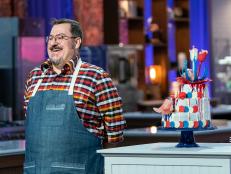 Contestant Eric Keppler presents his cake during the judging of the Master Challenge, as seen on Best Baker in America, Season 3.
