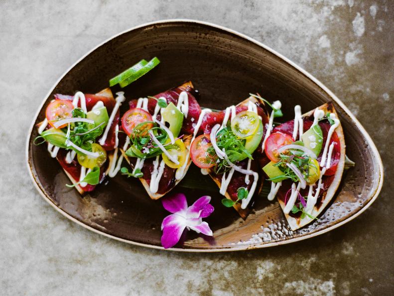 Mexican and Asian don’t seem like culinary soulmates, but <a target="_blank" href=https://www.foodnetwork.com/restaurants/photos/
