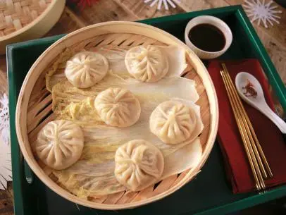 Beauty shot of Molly Yeh's Pork Soup Dumplings, as seen on Girl Meets Farm, Season 6.