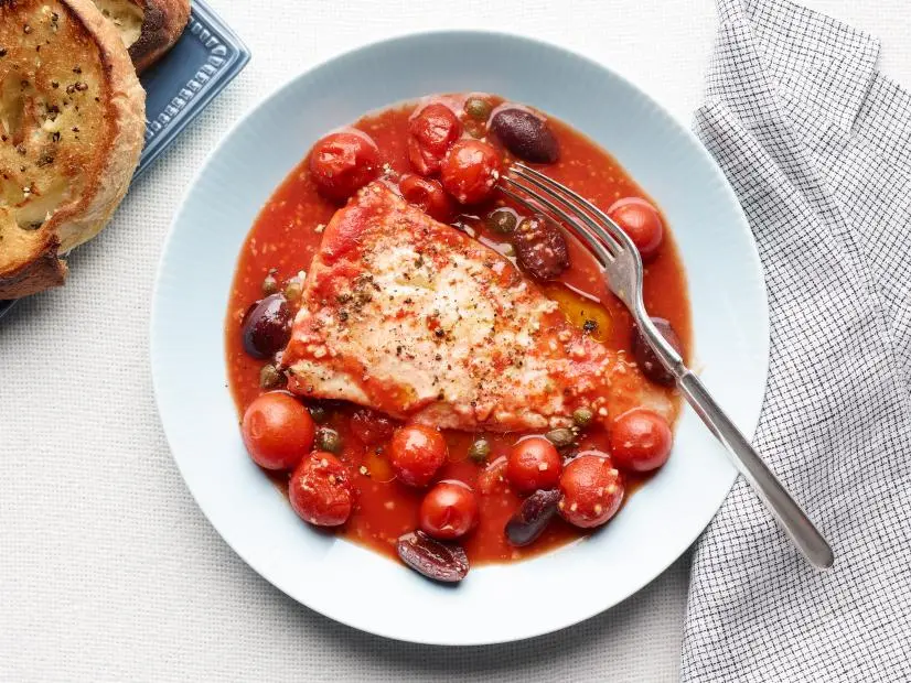 Food Network Kitchen’s Healthy Mediterranean Baked Haddock, as seen on Food Network.